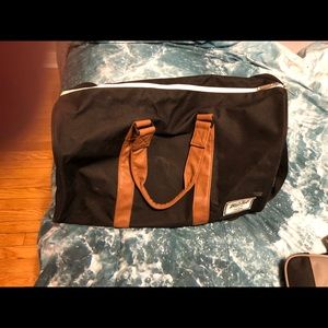 Assorted duffle bags